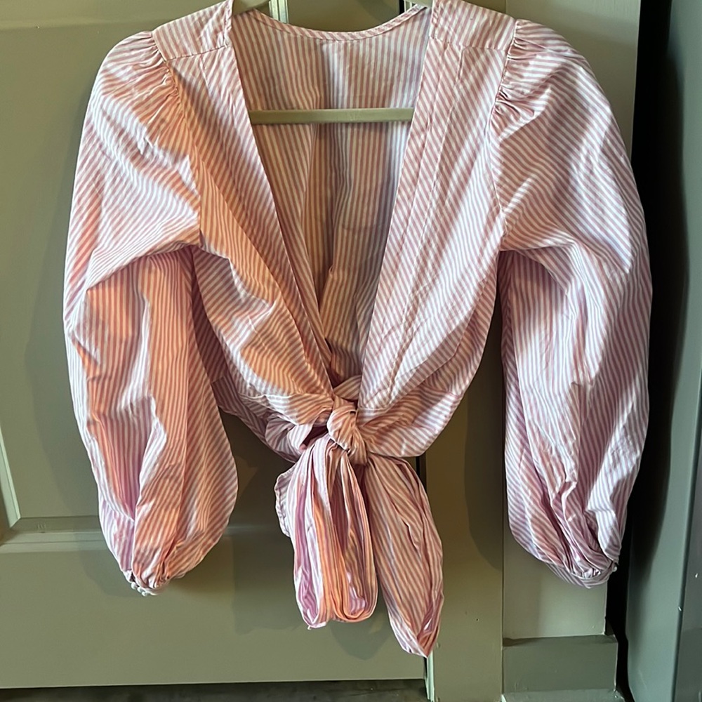Pink stripe blouse. Low cut with a tie wrap
